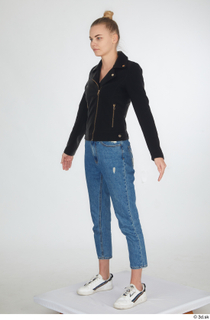 Kate Jones black leather jacket blue jeans casual dressed standing…